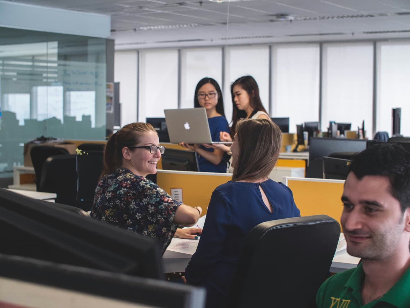 VasoHealth professional team in a modern healthcare backoffice environment